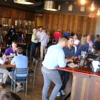The Young Alumni Council gather at Founders Brewing Co.